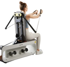 Woman using a rowing machine in a home setting