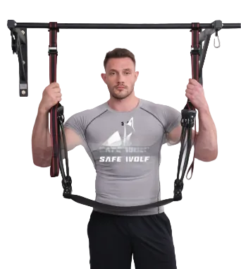 Man using a pull-up bar with a white background