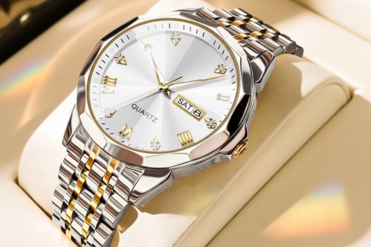 Olevs men's quartz watch with a silver and gold two-tone stainless steel link bracelet, a white dial with gold Roman numerals, and a date window at 3 o'clock, displayed on a beige watch cushion.