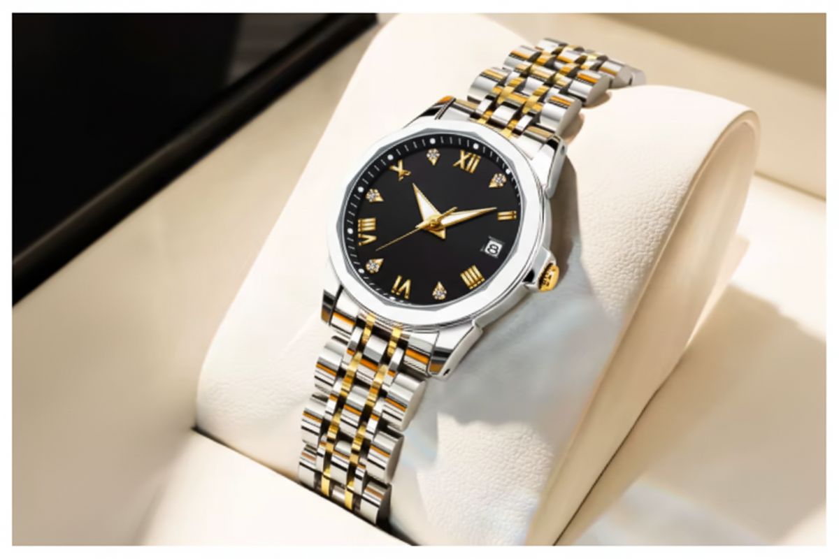 Olevs men's watch with a two-tone silver and gold metal bracelet, a black dial, and gold accents, displayed on a cream-colored watch cushion.
