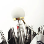 Close-up of a perfume bottle with a white cap and gold cap, on a white background.