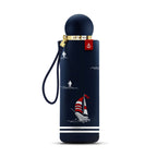 Navy blue umbrella with sailboat design on a white background