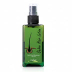Ouhoe Hair Lotion packaging with green bottle and box on a white background