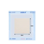 Packaged heat-sealable patch with dimensions on a white background