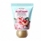 Hand cream packaging with peach illustration on a white background