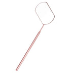 Rose gold fly swatter with measurements on a white background