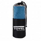 Blue microfiber towel with carrying bag on a white background