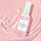 Rose water spray bottle on a pink water background with text about its benefits.