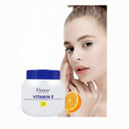 Vitamin E cream jar with a woman's face and text highlighting benefits