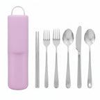 Set of pink tools with a keychain attachment on a white background
