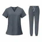 Gray medical uniform set with top and pants on a white background