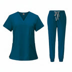 Teal medical uniform set with top and pants on a white background