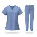 Medical uniform set with top and pants on a white background