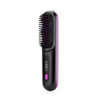 Black hairbrush with digital display on a white background