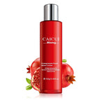 Red skincare bottle with pomegranate graphics on a white background