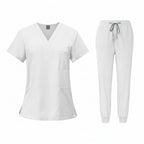 White medical uniform set with top and pants on a white background