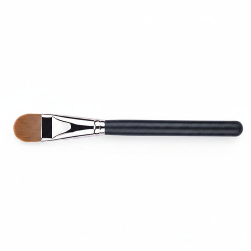 Ultra-thin foundation brush with black handle and silver ferrule on a white background