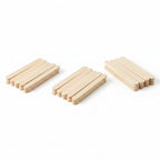 Wooden popsicle sticks with a close-up of a stick being held, on a light blue background.