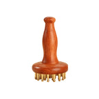 Wooden massage tool with brass needles and measurements on a white background