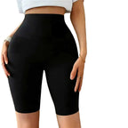 Person wearing black athletic shorts with 'Flying Form' logo, with additional shorts displayed in the background.