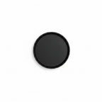 Black round object held in a hand with a smaller object and '8*8cm' text on a white background