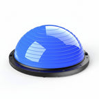 Blue balance ball with black base on a white background