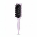 Two hairbrushes with different bristle designs on a white background