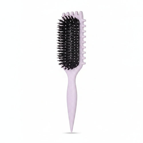 Two hairbrushes with different bristle designs on a white background