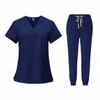 Navy blue medical uniform set with top and pants on a white background